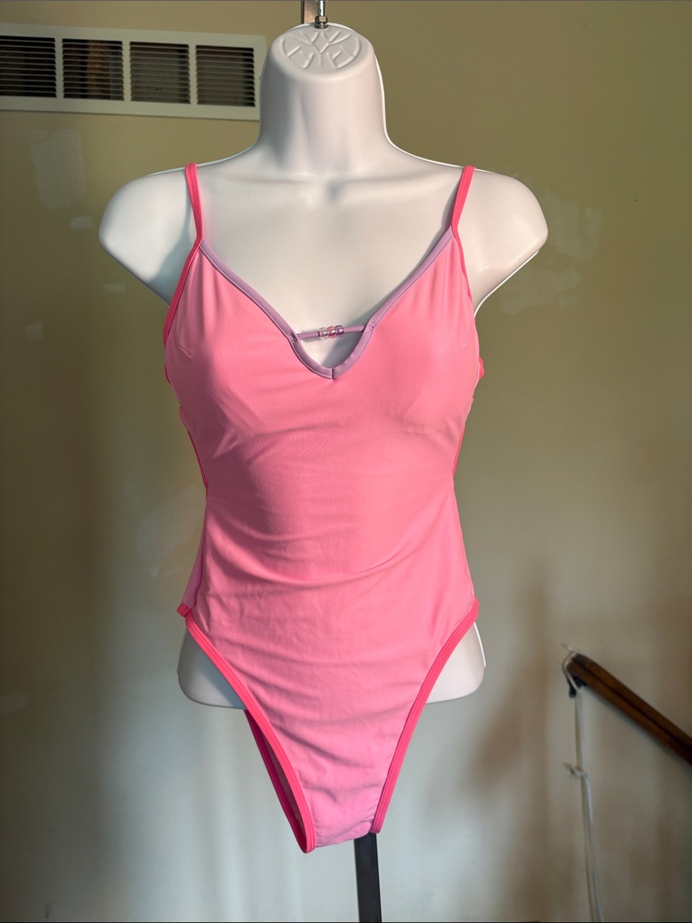 Women's Pink One-Piece Swimsuit - Sleek V-Neck Design